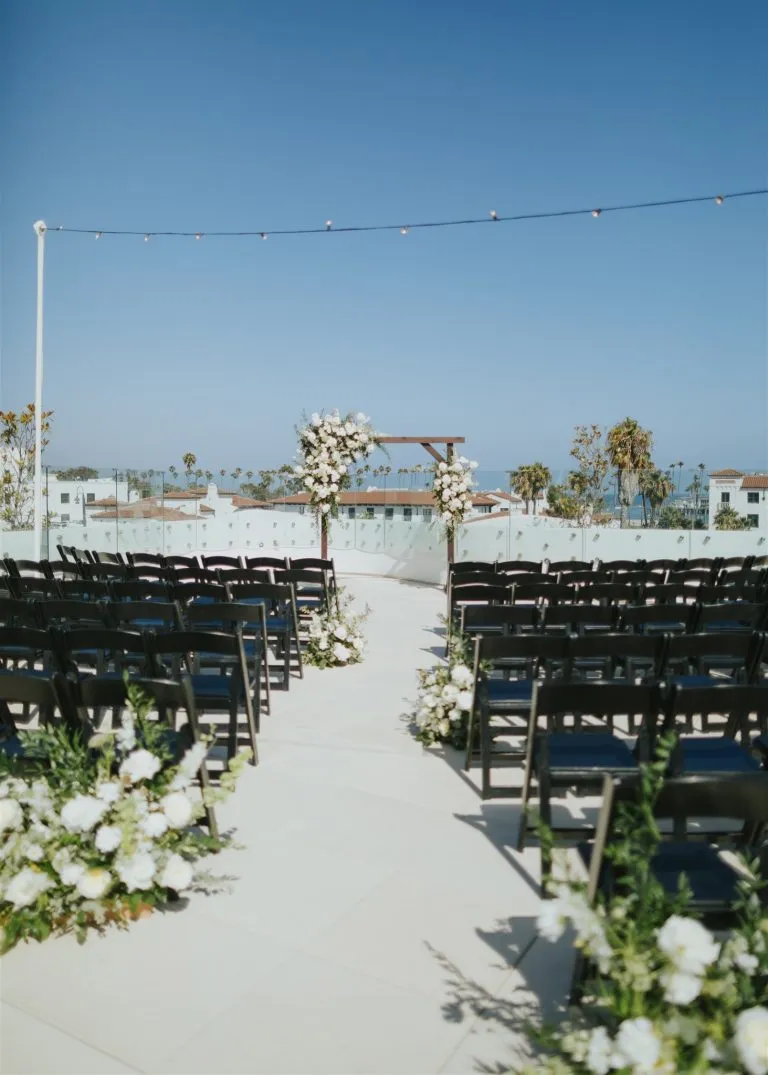 black chairs at a beach event