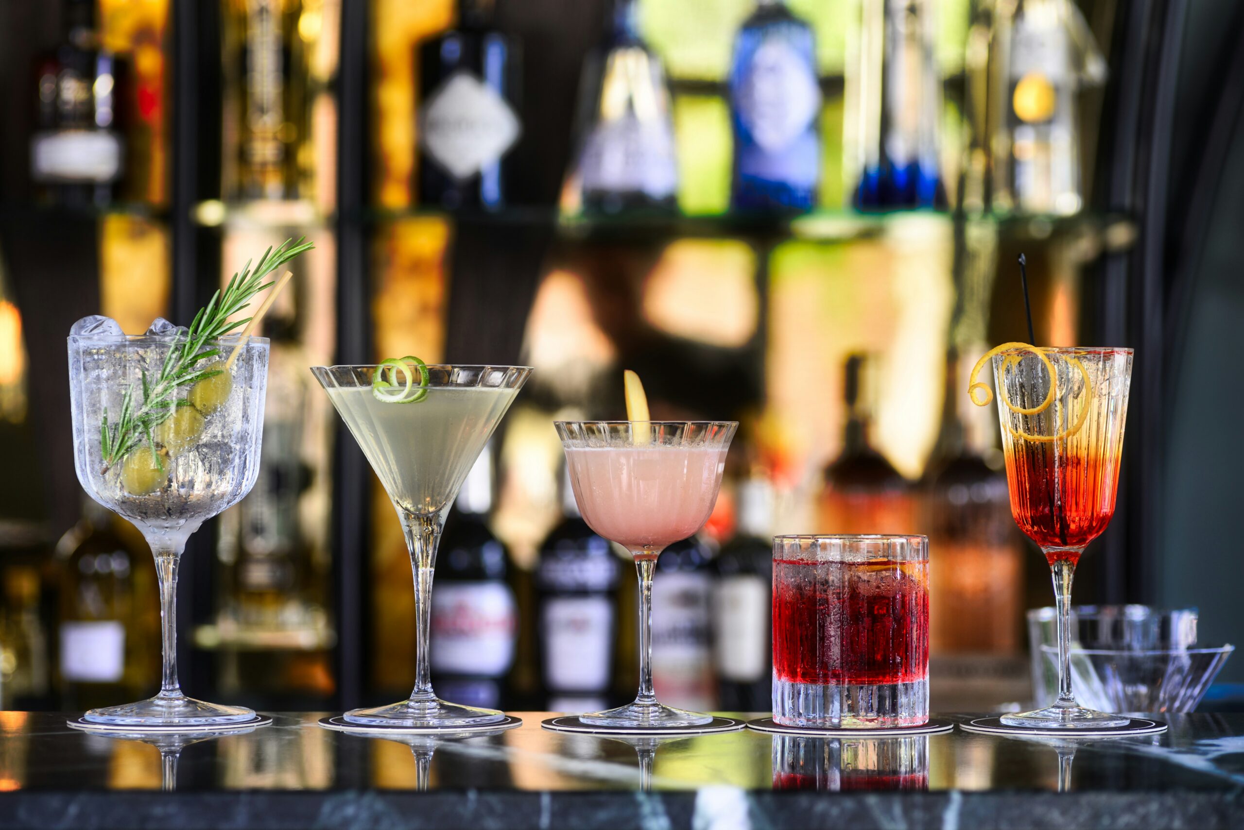 different types of cocktails on the table