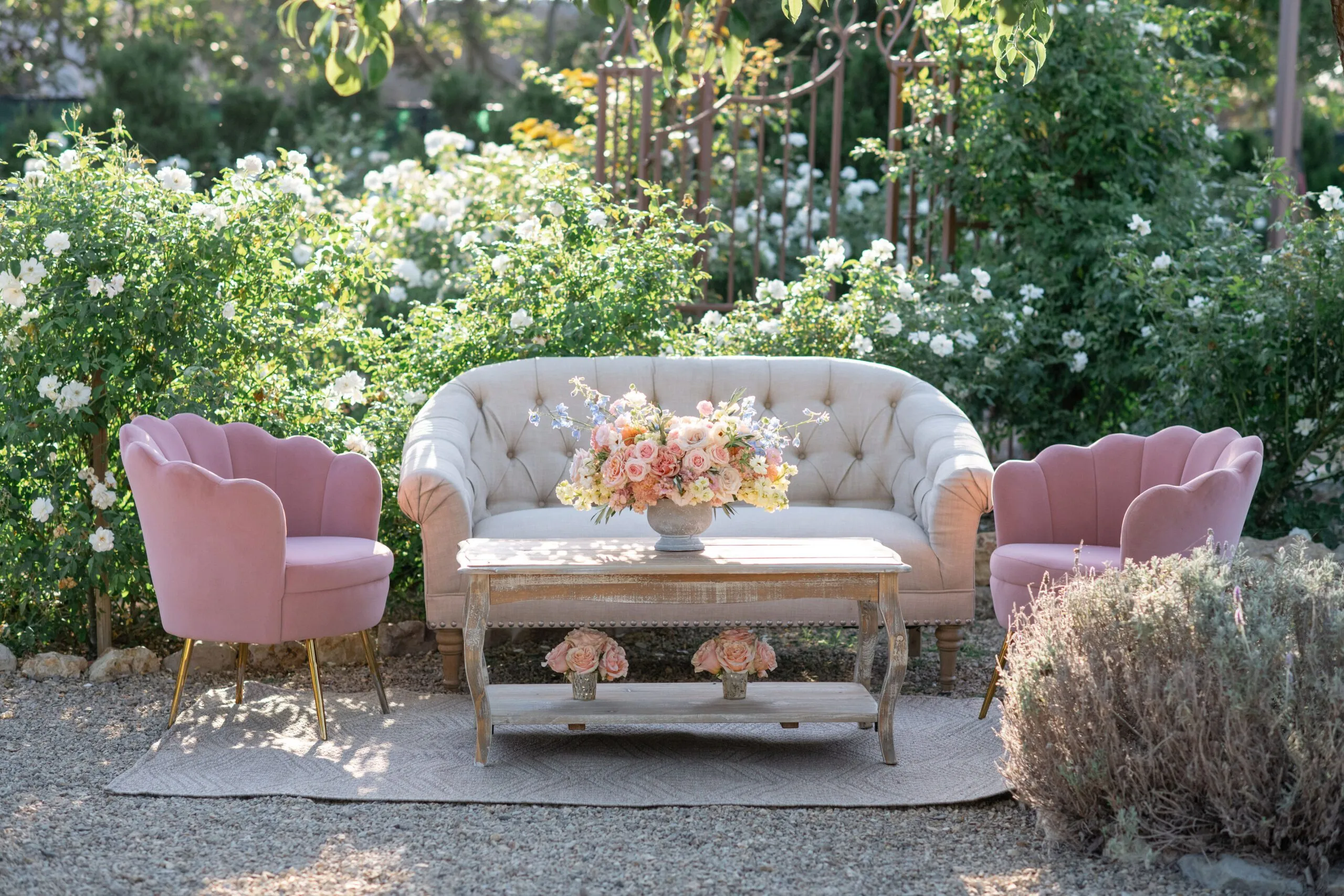 pink and white sofas at event